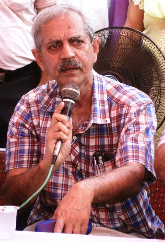 Dr Arun Mitra