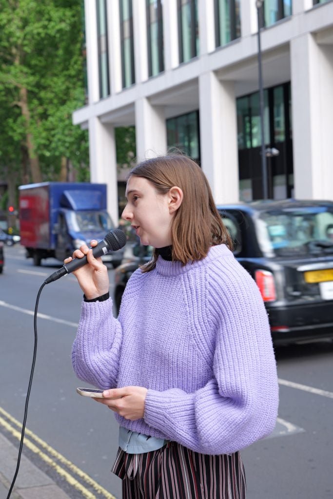 Dr Jasmine Abbott gives a speech at the demonstration